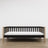 Juoda medinė sofa-lova su ąžuolu - vaizdas iš šono, baldų forma ir proporcijos