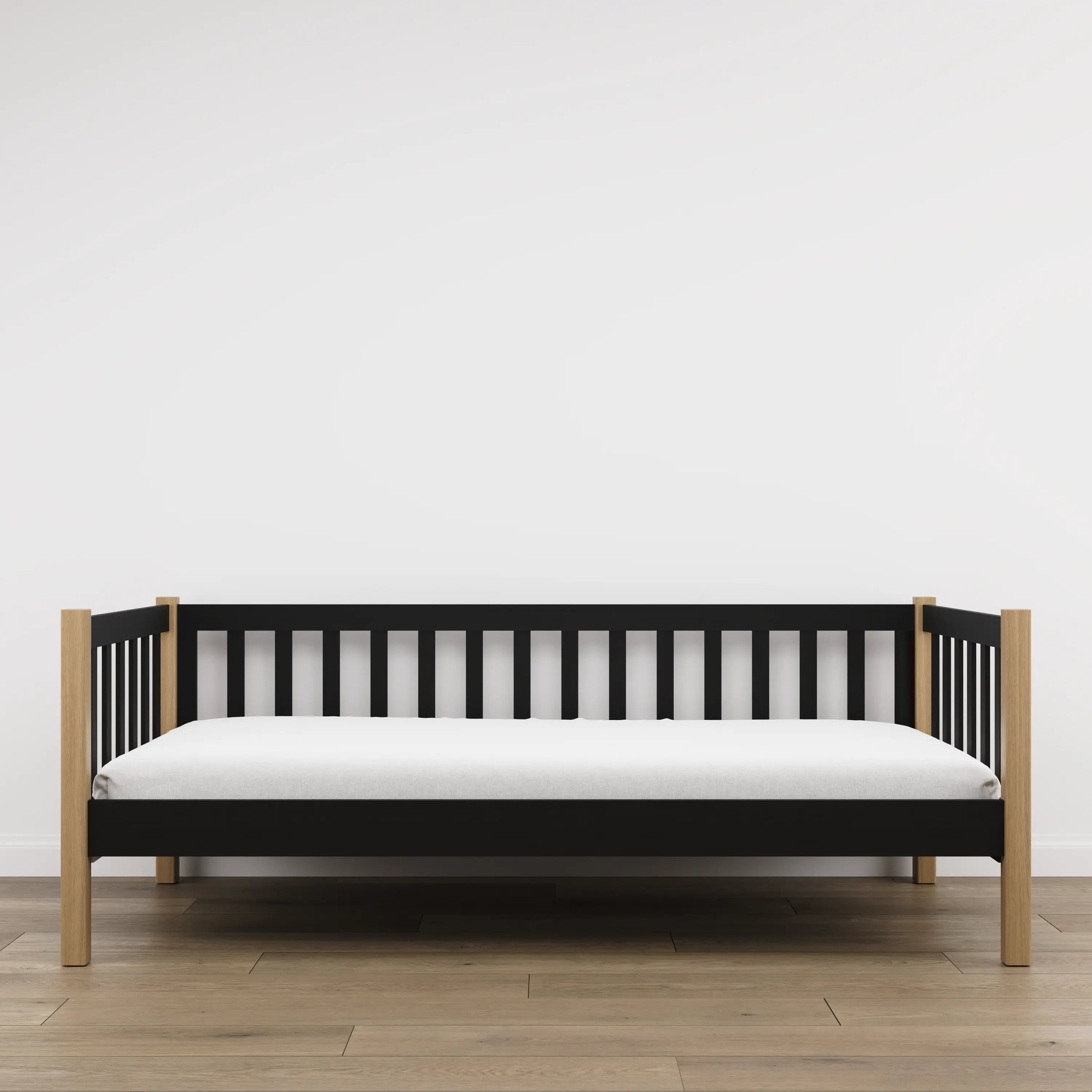 Juoda medinė sofa-lova su ąžuolu - vaizdas iš šono, baldų forma ir proporcijos
